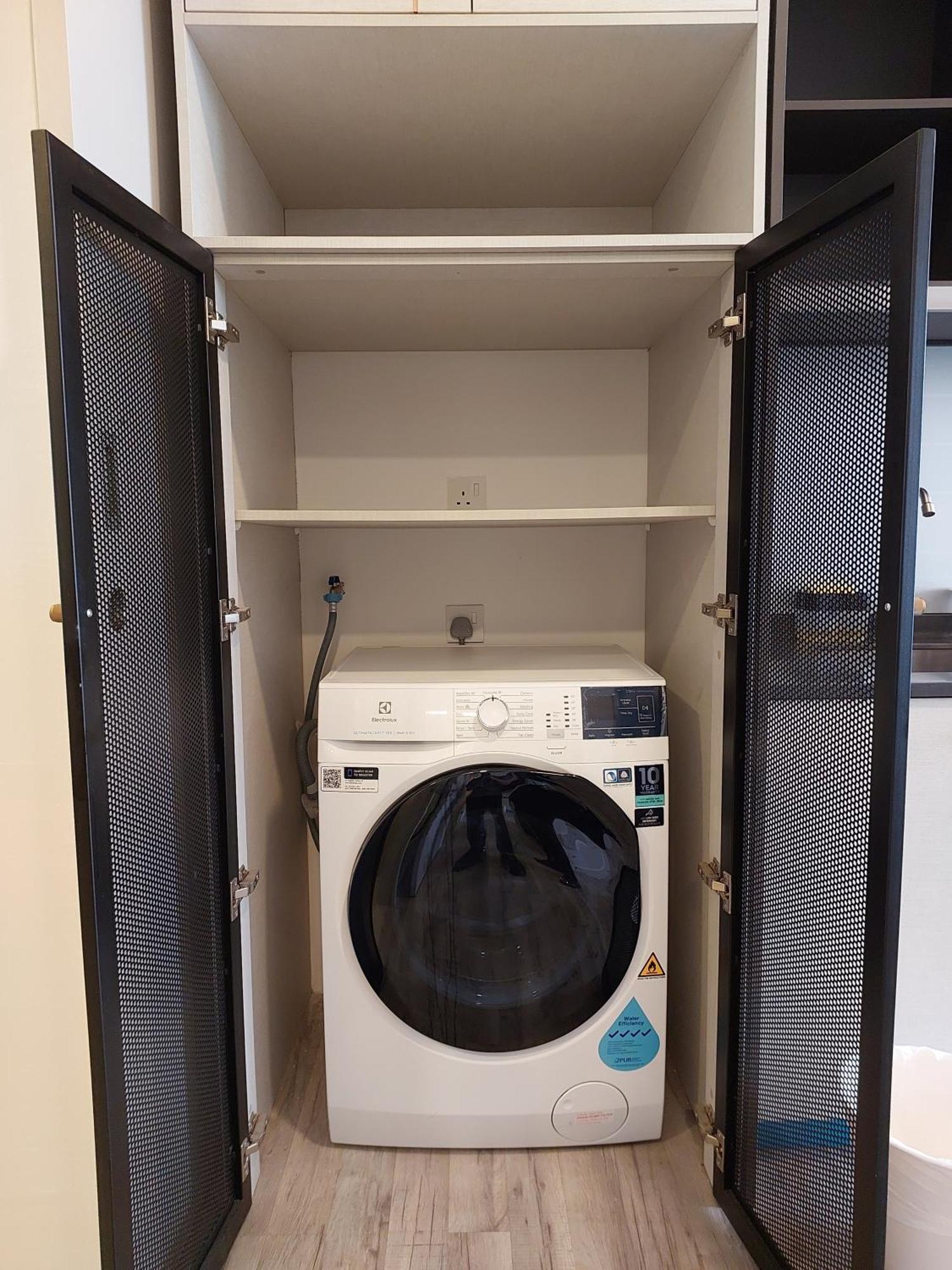 Millerz Square By Mykey Apartman Kuala Lumpur Kültér fotó A washing machine in a laundry room
