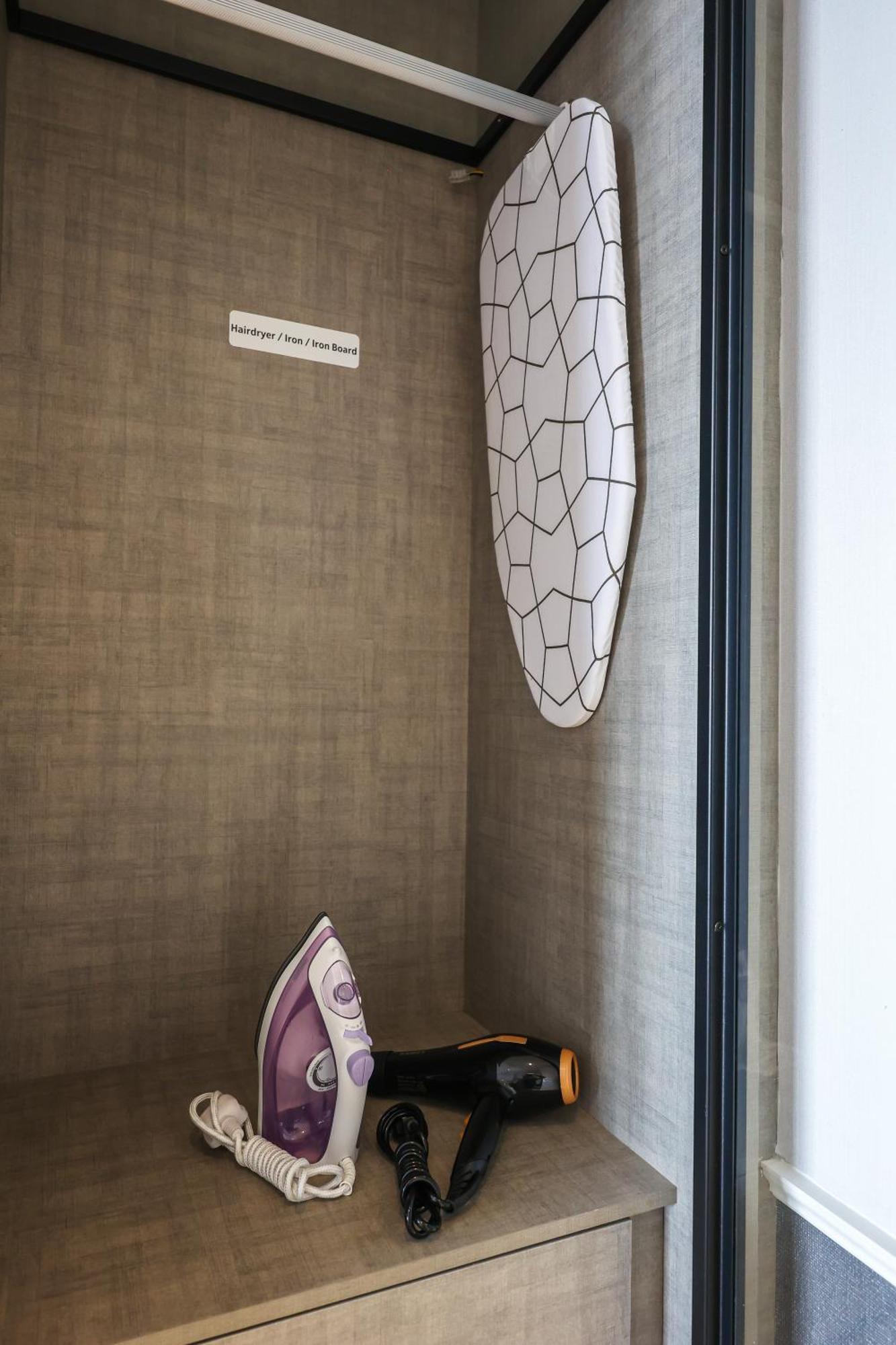 Millerz Square By Mykey Apartman Kuala Lumpur Kültér fotó A refrigerator with a built-in ironing board