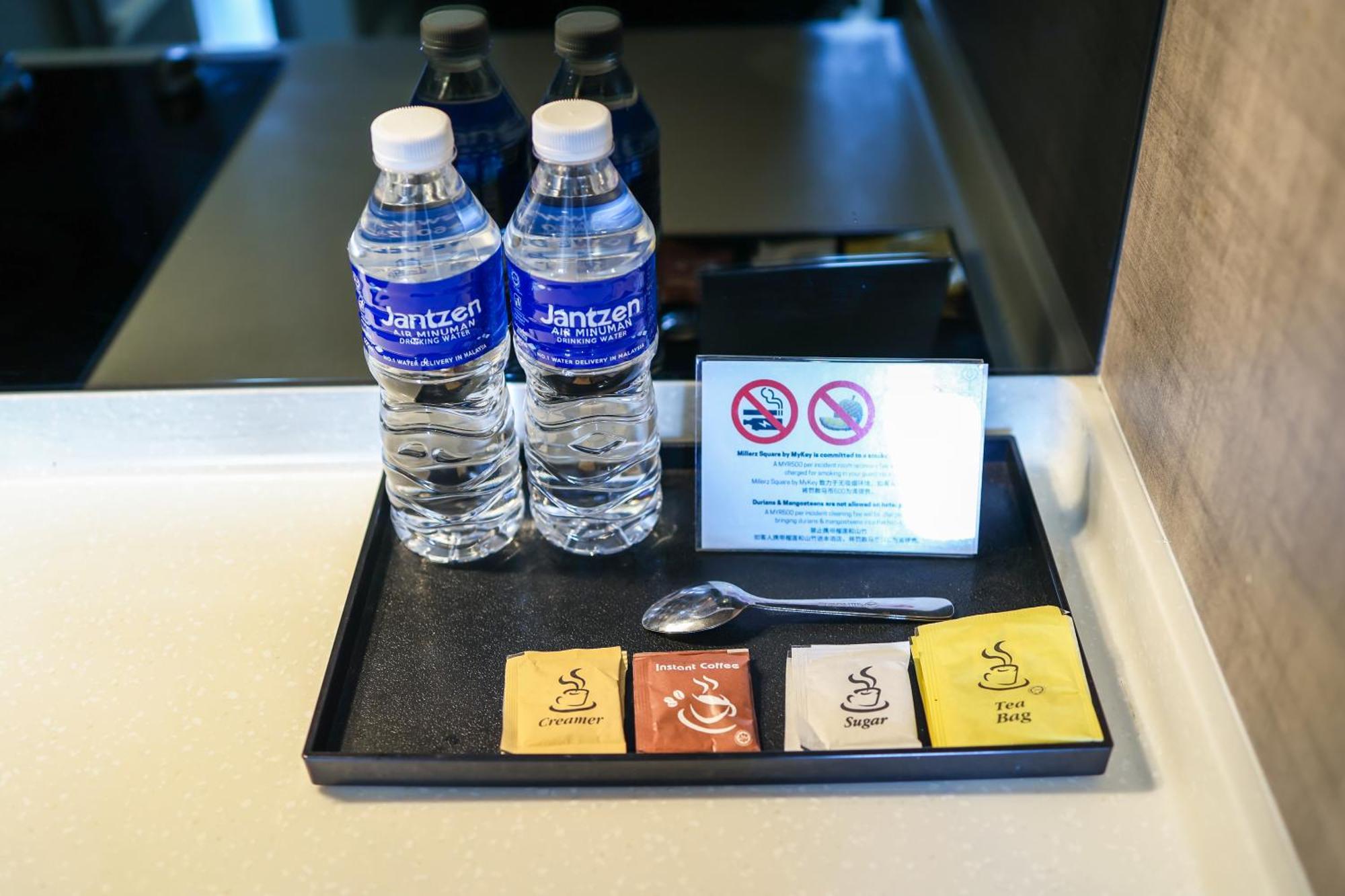 Millerz Square By Mykey Apartman Kuala Lumpur Kültér fotó Bottled water and tea bags in a hotel room